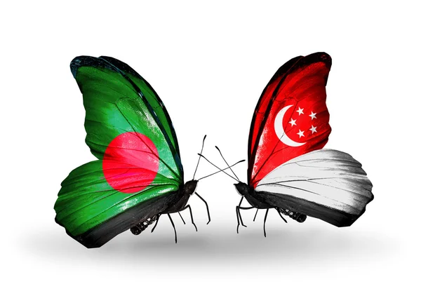 Mariposas con banderas de Bangladesh y Singapur en alas —  Fotos de Stock