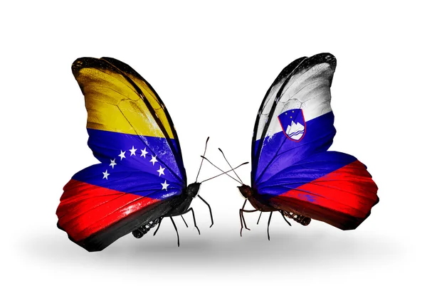 翼にベネズエラとスロベニアのフラグと蝶 — ストック写真