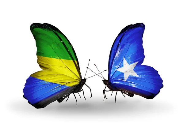 Borboletas com bandeiras Gabão e Somália em asas — Fotografia de Stock