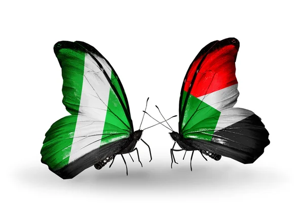 Mariposas con banderas de Nigeria y Sudán en alas — Foto de Stock