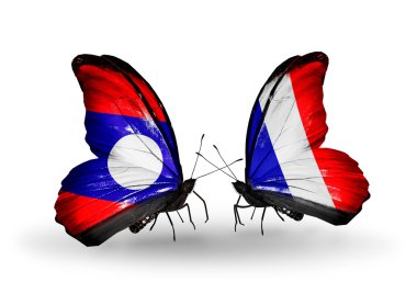 Kelebek kanatları üzerinde laos ve Fransa bayraklı