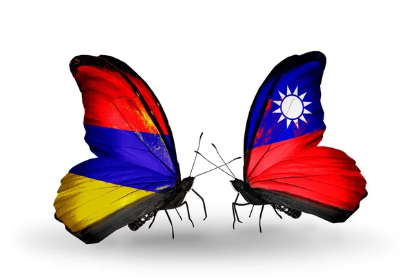 Motýli s Arménií a Tchaj-wanu vlajky na křídlech — Stock fotografie