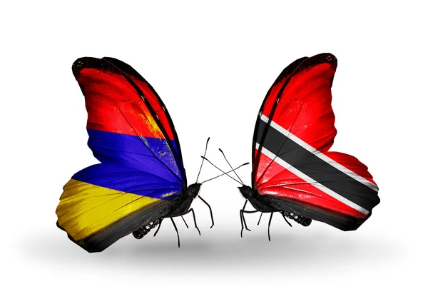 Butterflies with Armenia and  Trinidad and Tobago flags on wings — Stock Photo, Image