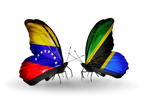 Papillons avec drapeaux Venezuela et Tanzanie sur les ailes — Photo