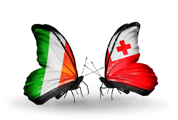 Farfalle con bandiere Irlanda e Tonga sulle ali — Foto Stock