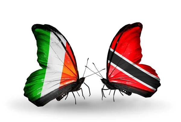 Borboletas com bandeiras da Irlanda e de Trinidad e Tobago em asas — Fotografia de Stock