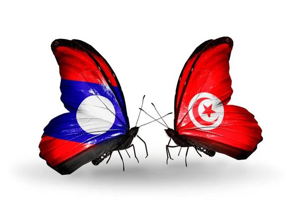 Butterflies with Laos and Tunisia flags on wings — Stock Photo, Image