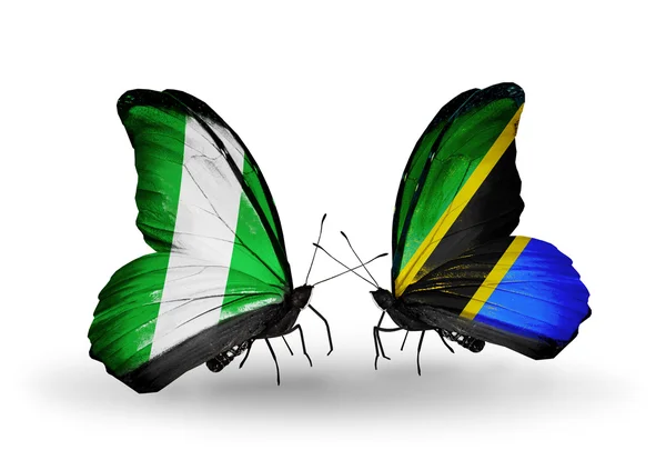 翼のナイジェリアそしてタンザニアのフラグと蝶 — ストック写真