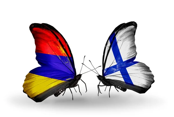 Butterflies with Armenia and  Finland flags on wings — Stock Photo, Image