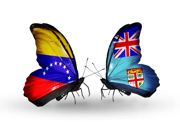 Papillons avec drapeaux Venezuela et Fidji sur les ailes — Photo