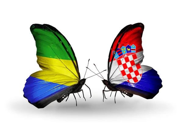 Butterflies with Gabon and Croatia flags on wings — Stock Photo, Image
