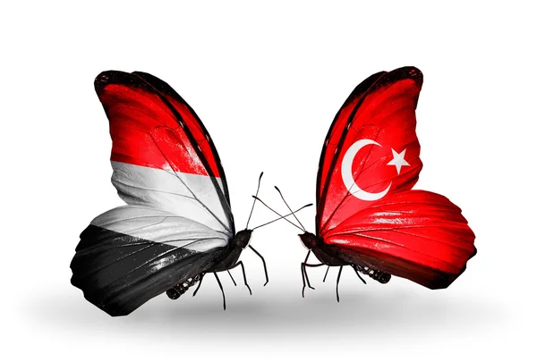 Butterflies with Yemen and Turkey flags on wings — Stock Photo, Image