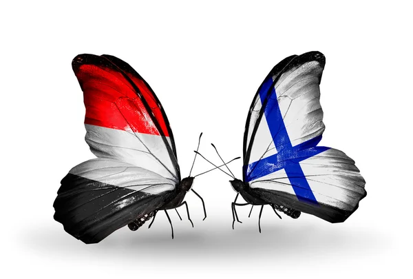 Butterflies with Yemen and Finland flags on wings — Stock Photo, Image