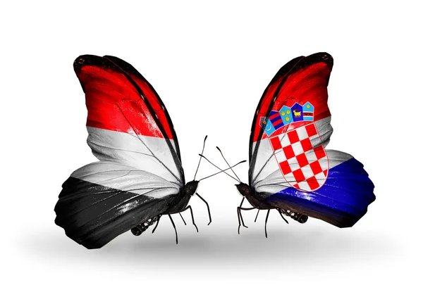 Papillons avec drapeaux du Yémen et de Croatie sur les ailes — Photo