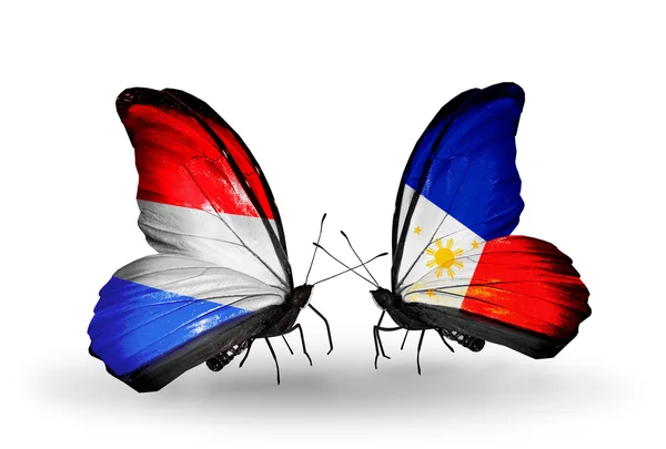Vlinders met Luxemburg en Filippijnen vlaggen op vleugels — Stockfoto