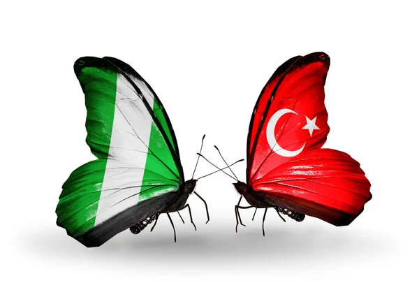 Butterflies with Nigeria and Turkey flags on wings — Stock Photo, Image