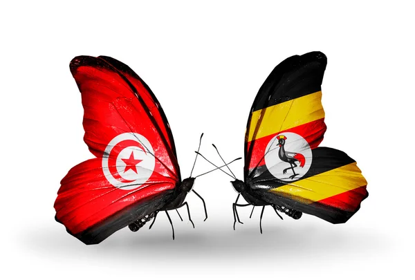 Motyle z Tunezji i uganda flagi na skrzydłach — Zdjęcie stockowe