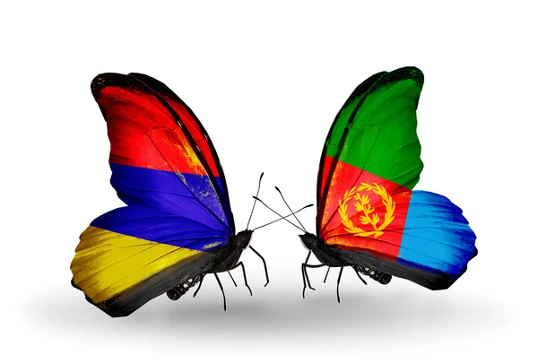 Borboletas com bandeiras da Armênia e Eritreia em asas — Fotografia de Stock