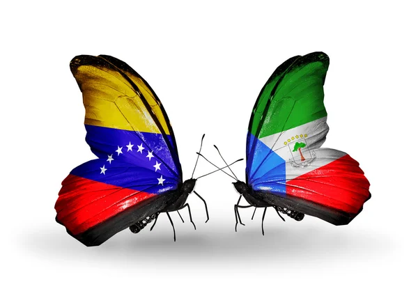 Butterflies with Venezuela and Equatorial Guinea flags on wings — Stock Photo, Image
