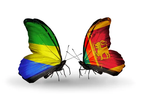 Бабочки с флагами Габона и Шри-Ланки на крыльях — стоковое фото