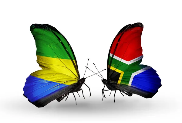 Kelebekler kanat gabon ve Güney Afrika bayrakları — Stok fotoğraf