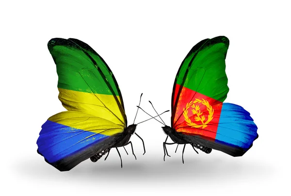 Butterflies with Gabon and Eritrea flags on wings — Stock Photo, Image
