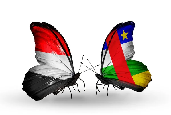 Butterflies with Yemen and Central African Republic flags on wings — Stock Photo, Image