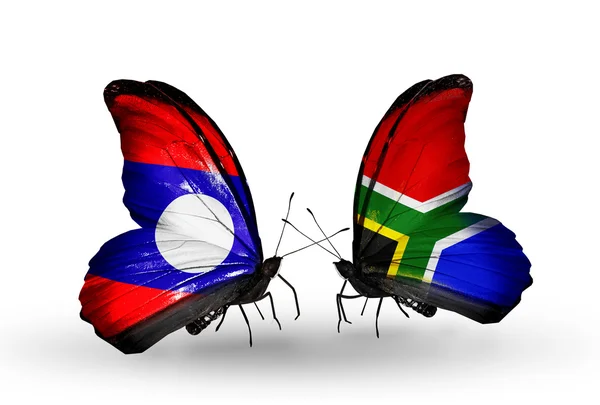 Butterflies with Laos and South Africa flags on wings — Stock Photo, Image