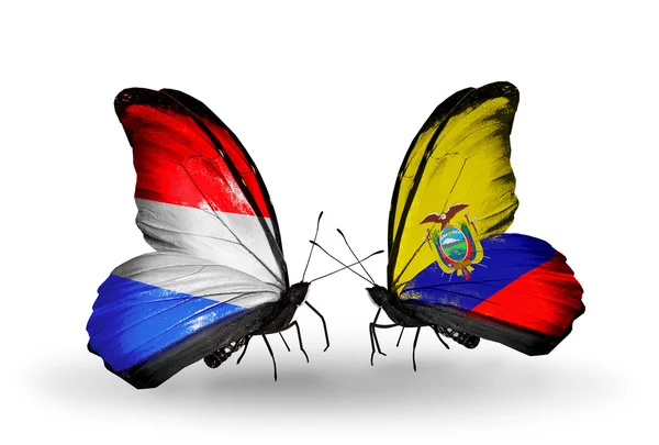 Butterflies with Luxembourg and Ecuador flags on wings — Stock Photo, Image