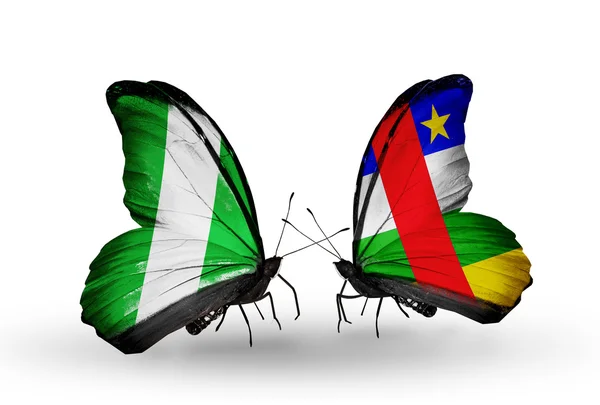 Butterflies with Nigeria and Central African Republic flags on wings — Stock Photo, Image