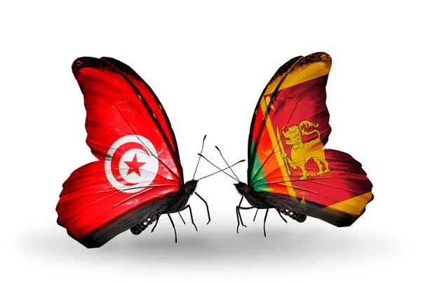 Бабочки с флагами Туниса и Шри-Ланки на крыльях — стоковое фото