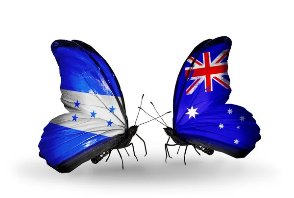 Papillons avec drapeaux Honduras et Australie sur les ailes — Photo