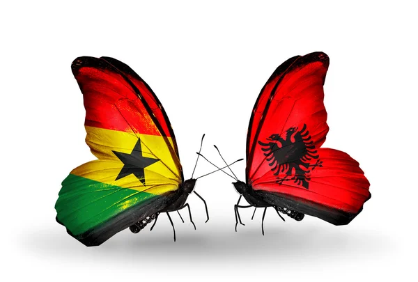 Motýli s příznaky ghana a Albánie na křídlech — Stock fotografie
