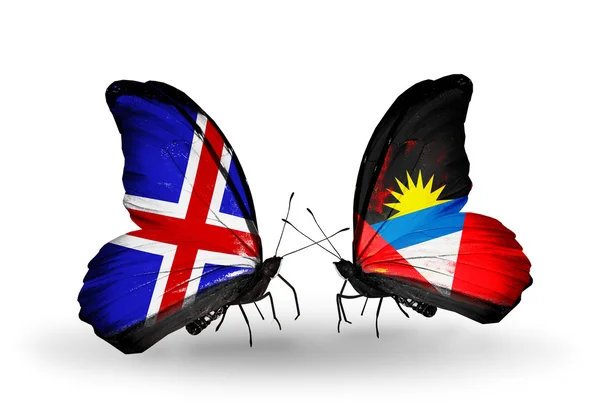 Farfalle con bandiere Antigua e Barbuda sulle ali — Foto Stock