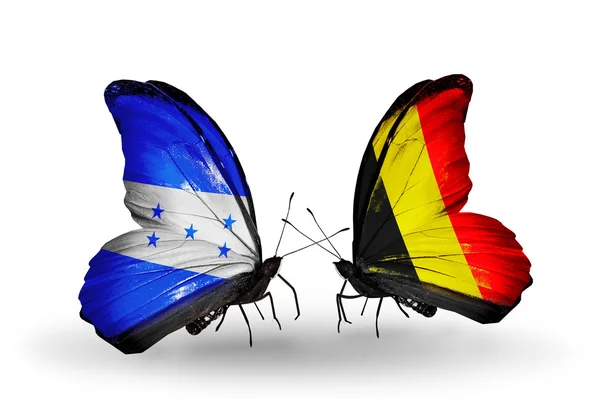 Mariposas con banderas de Honduras y Bélgica en alas — Foto de Stock