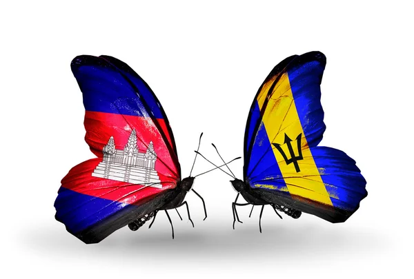 Бабочки с флагами Камбоджи и Барбадоса на крыльях — стоковое фото
