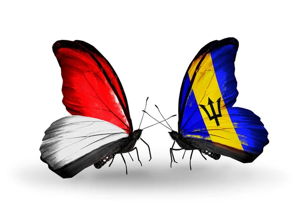 Butterflies with Monaco, Indonesia and Barbados flags on wings — Stock Photo, Image