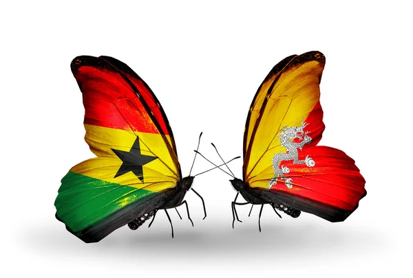 Schmetterlinge mit Ghana- und Bhutanfahnen auf Flügeln — Stockfoto