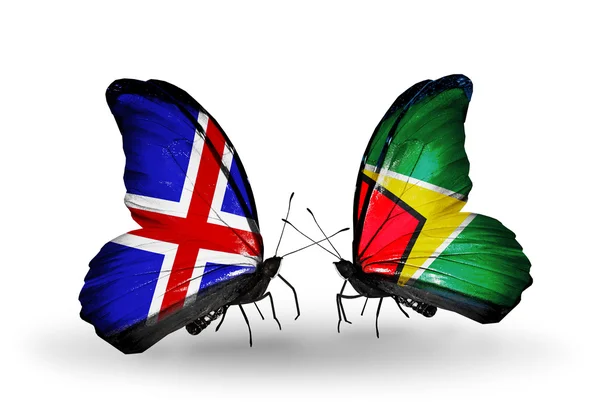 Mariposas con banderas de India y Guyana en alas — Foto de Stock