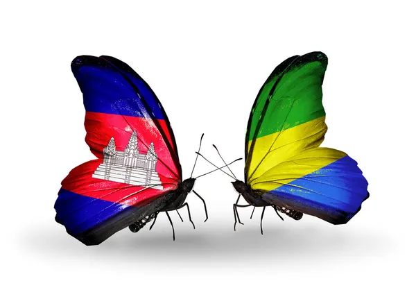 Бабочки с флагами Камбоджи и Габона на крыльях — стоковое фото