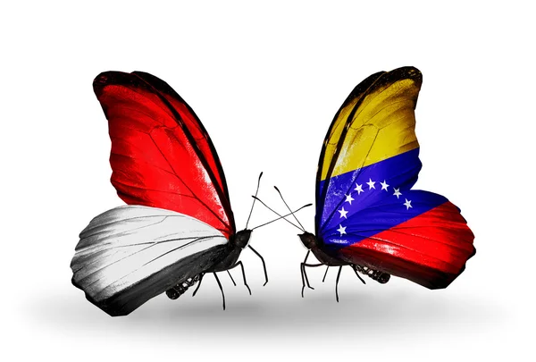 Schmetterlinge mit Monaco, Indonesien und Venezuela-Fahnen auf Flügeln — Stockfoto