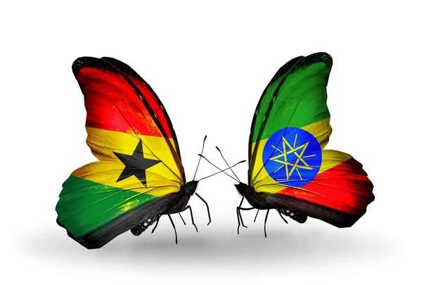 Mariposas con banderas de Ghana y Etiopía en alas — Foto de Stock