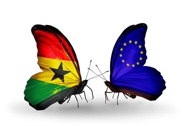 Mariposas con banderas de ghana y la Unión Europea en las alas — Stock fotografie