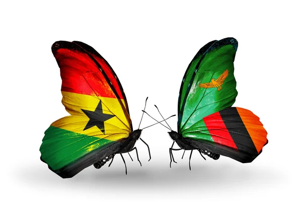 Butterflies with Ghana and Zambia flags on wings — Stock Photo, Image