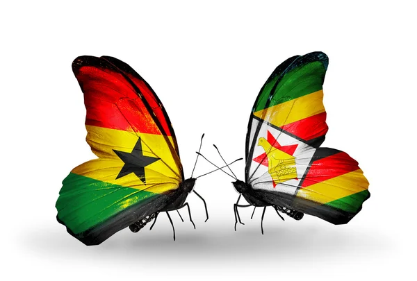 Butterflies with Ghana and Zimbabwe flags on wings — Stock Photo, Image