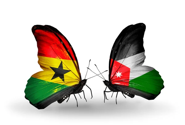 Papillons avec drapeaux Ghana et Jordanie sur les ailes — Photo