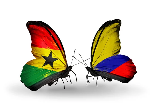 Papillons avec des drapeaux Ghana et Columbia sur les ailes — Photo