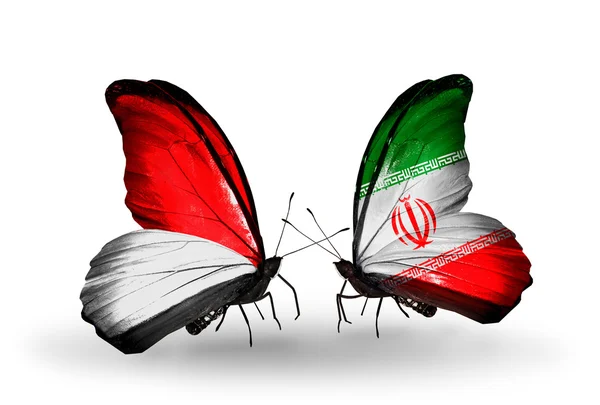 Butterflies with Monaco, Indonesia and Iran flags on wings — Stock Photo, Image