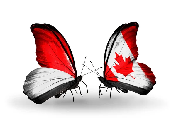 蝴蝶翅膀上的摩纳哥、 印度尼西亚和加拿大国旗 — 图库照片