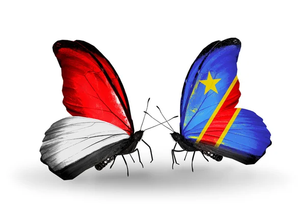 Schmetterlinge mit Monaco, Indonesien und Kongo-Flaggen auf Flügeln — Stockfoto